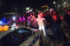 ‘DANGEROUS’: Gunman at large after two officers shot in Ferguson protest